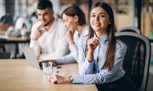 Group of people working out business plan in an office
