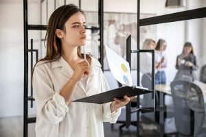 side-view-woman-office-with-clipboard-scaled-1.jpg