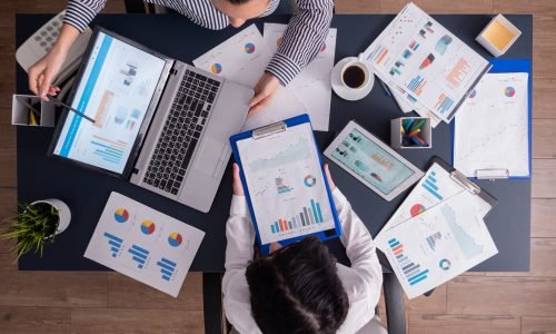 Top view of manager and employee doing teamwork